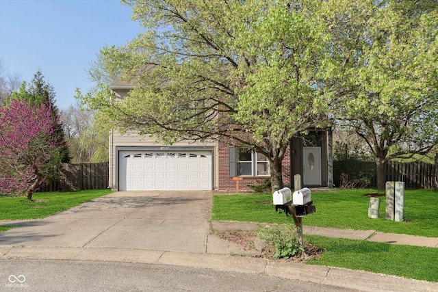 9011 Harrison Run Dr, Indianapolis, IN 46256 - obstructed view of property featuring concrete driveway and brick siding
