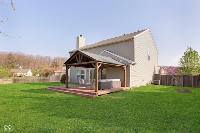 9011 Harrison Run Dr, Indianapolis, IN 46256 - rear view of property with a gazebo, a wooden deck, central AC unit, and a chimney