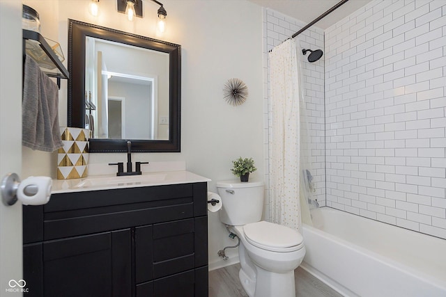 9011 Harrison Run Dr, Indianapolis, IN 46256 - bathroom featuring toilet, vanity, shower / bath combination with curtain, and wood finished floors