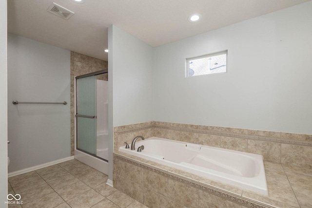 3792 Waterfront Way, Plainfield, IN 46168 - full bathroom featuring tile patterned flooring, visible vents, a stall shower, and a garden tub