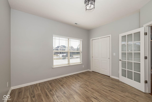 3792 Waterfront Way, Plainfield, IN 46168 - spare room with visible vents, baseboards, and wood finished floors