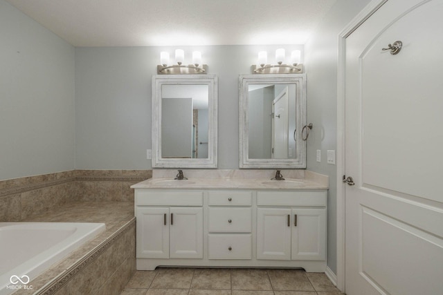 3792 Waterfront Way, Plainfield, IN 46168 - bathroom with tile patterned floors, a bath, double vanity, and a sink