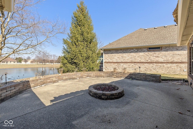 3792 Waterfront Way, Plainfield, IN 46168 - view of patio / terrace with a water view and an outdoor fire pit