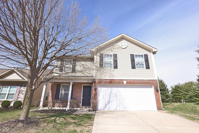5944 Edelle Dr, Indianapolis, IN 46237 - traditional-style home featuring a garage, brick siding, and driveway