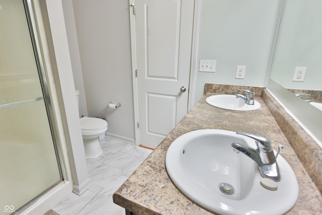 5944 Edelle Dr, Indianapolis, IN 46237 - bathroom featuring a shower stall, toilet, marble finish floor, and a sink