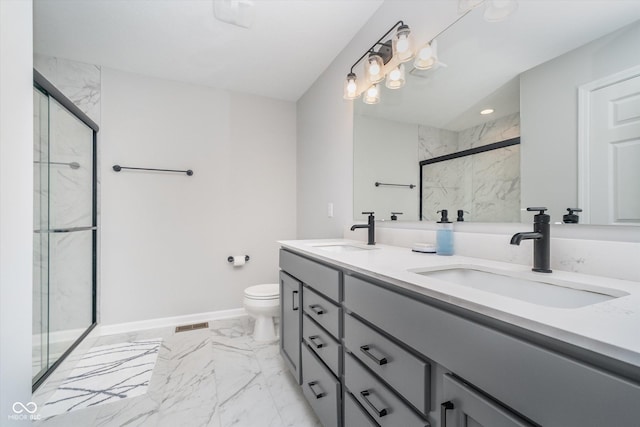 full bath featuring marble finish floor, toilet, a sink, and a marble finish shower