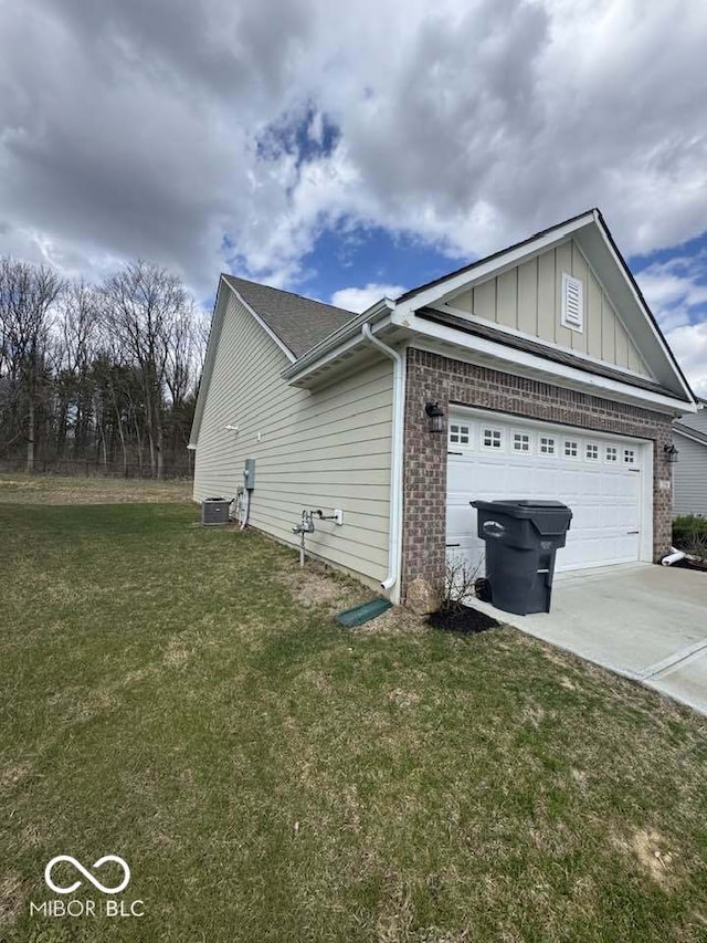 view of property exterior featuring concrete driveway, board and batten siding, a garage, central AC, and a lawn
