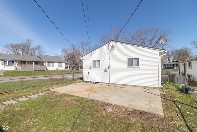1701 Nelson Ave, Indianapolis, IN 46203 - back of house with a yard, fence, and a patio area