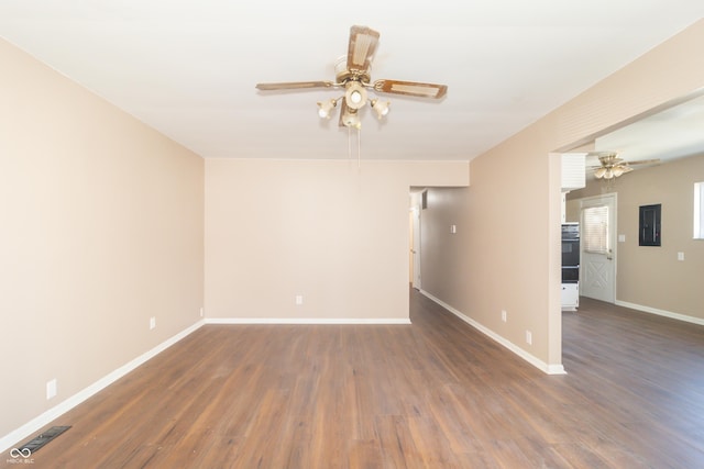 1701 Nelson Ave, Indianapolis, IN 46203 - spare room featuring wood finished floors and a ceiling fan