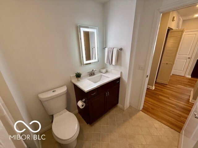 110 E Washington St Unit 802, Indianapolis, IN 46204 - bathroom with vanity and tile patterned flooring