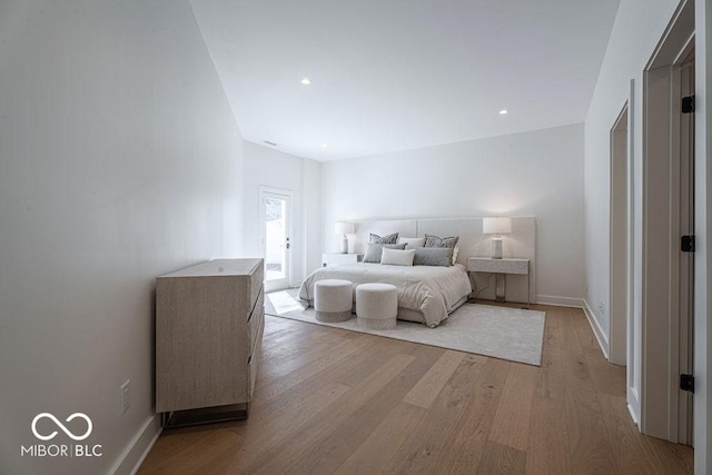 395 Breakwater Dr, Fishers, IN 46037 - bedroom featuring baseboards and light wood-type flooring