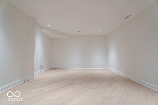 395 Breakwater Dr, Fishers, IN 46037 - spare room with visible vents, baseboards, and light wood-type flooring
