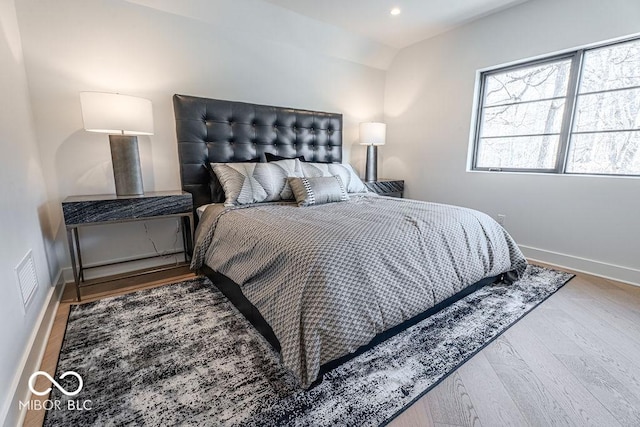 395 Breakwater Dr, Fishers, IN 46037 - bedroom featuring baseboards, visible vents, wood finished floors, and recessed lighting