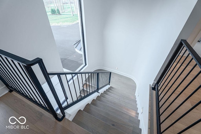 395 Breakwater Dr, Fishers, IN 46037 - staircase featuring baseboards and wood finished floors