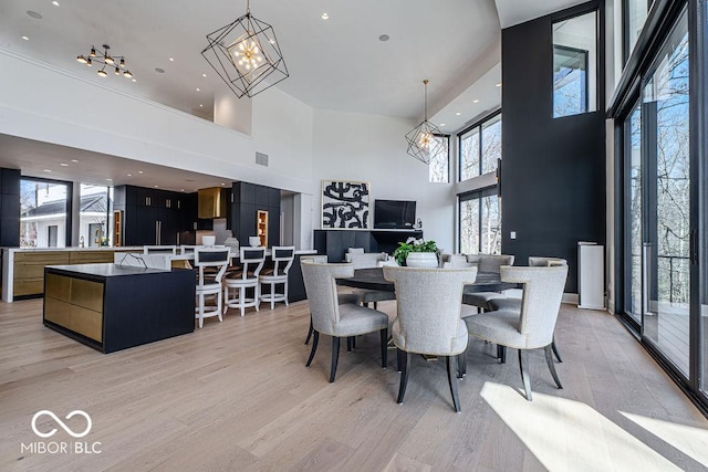 395 Breakwater Dr, Fishers, IN 46037 - dining room featuring a notable chandelier, visible vents, recessed lighting, and light wood-type flooring