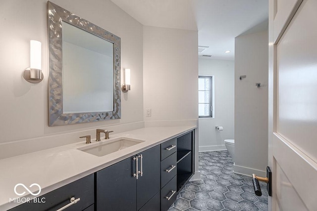 395 Breakwater Dr, Fishers, IN 46037 - bathroom featuring baseboards, toilet, and vanity