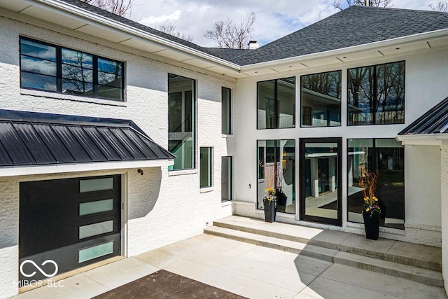 395 Breakwater Dr, Fishers, IN 46037 - exterior space with stucco siding and a shingled roof