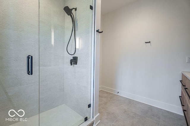 395 Breakwater Dr, Fishers, IN 46037 - full bath with a shower stall, baseboards, vanity, and tile patterned floors