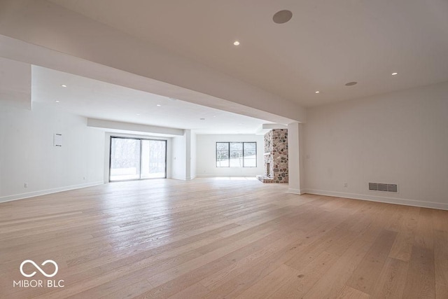 395 Breakwater Dr, Fishers, IN 46037 - empty room featuring light wood-style flooring, recessed lighting, baseboards, and visible vents