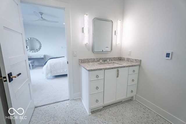 395 Breakwater Dr, Fishers, IN 46037 - ensuite bathroom with baseboards, ensuite bath, ceiling fan, and vanity