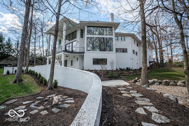 395 Breakwater Dr, Fishers, IN 46037 - view of front of home featuring a balcony and stucco siding