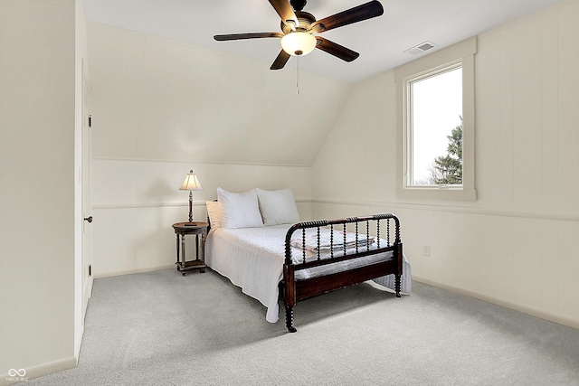 450 W Ash St, Zionsville, IN 46077 - bedroom with visible vents, ceiling fan, light colored carpet, and vaulted ceiling