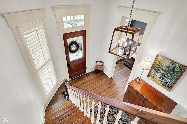 450 W Ash St, Zionsville, IN 46077 - foyer entrance featuring baseboards and wood finished floors