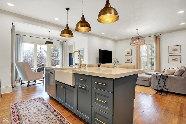 450 W Ash St, Zionsville, IN 46077 - kitchen with a sink, open floor plan, stainless steel dishwasher, and plenty of natural light