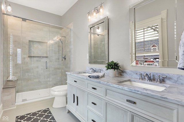 450 W Ash St, Zionsville, IN 46077 - bathroom with a sink, toilet, double vanity, and a stall shower