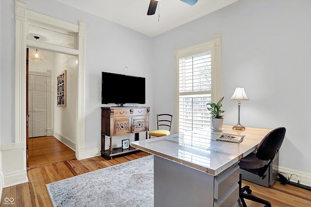 450 W Ash St, Zionsville, IN 46077 - office featuring baseboards, a ceiling fan, and wood finished floors