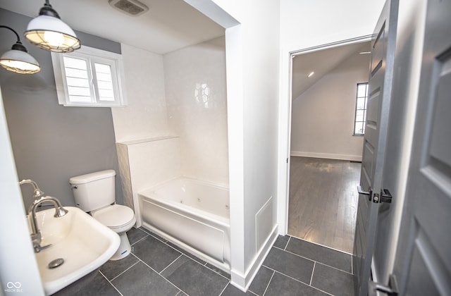 full bath featuring shower / tub combination, visible vents, toilet, and tile patterned flooring