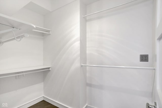 932 Broadway St # 15, Indianapolis, IN 46202 - walk in closet featuring dark wood finished floors