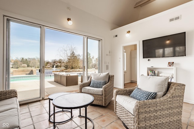 living area with lofted ceiling