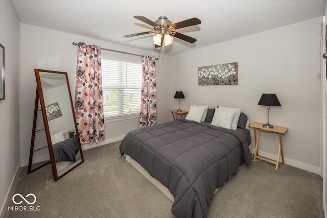 bedroom featuring carpet floors, baseboards, and a ceiling fan