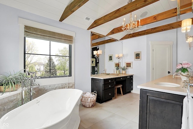 5120 Melbourne Pl, Zionsville, IN 46077 - full bathroom with two vanities, a freestanding bath, a chandelier, and tile patterned floors