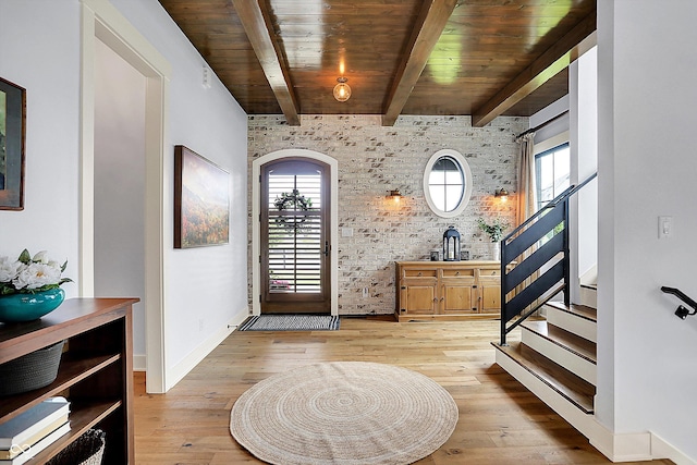 5120 Melbourne Pl, Zionsville, IN 46077 - entryway featuring wood ceiling with exposed beams, plenty of natural light, stairs, light wood-style floors, and baseboards