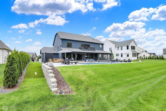 5120 Melbourne Pl, Zionsville, IN 46077 - back of house featuring a patio, a lawn, and a shingled roof