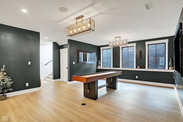 5120 Melbourne Pl, Zionsville, IN 46077 - game room featuring light wood-style floors, a chandelier, and baseboards