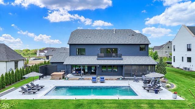 5120 Melbourne Pl, Zionsville, IN 46077 - back of house with a sunroom, a lawn, a patio, and roof with shingles