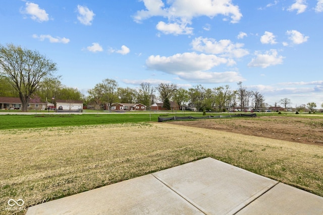 3913 Highcrest Rd, Indianapolis, IN 46239 - view of grassy yard featuring a patio area