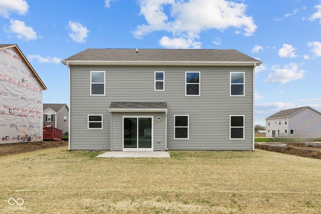 3913 Highcrest Rd, Indianapolis, IN 46239 - back of house featuring a yard, a patio area, and roof with shingles