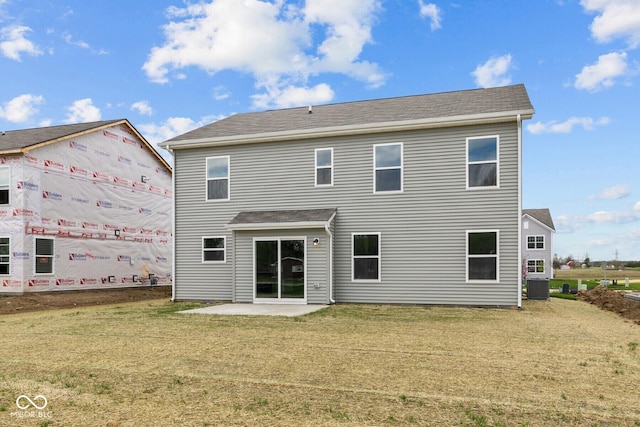 3913 Highcrest Rd, Indianapolis, IN 46239 - back of house with a lawn, a patio area, and central air condition unit