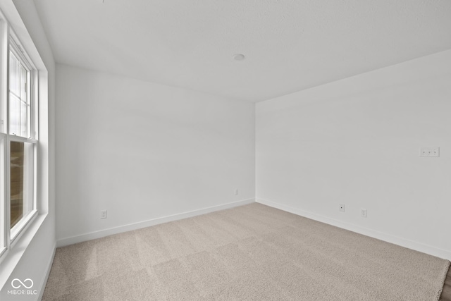 3913 Highcrest Rd, Indianapolis, IN 46239 - carpeted spare room with baseboards