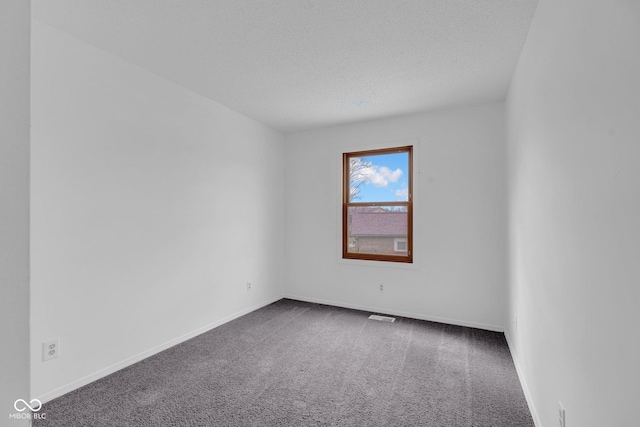 1847 Crystal Bay E Dr, Plainfield, IN 46168 - unfurnished room with baseboards, visible vents, carpet floors, and a textured ceiling