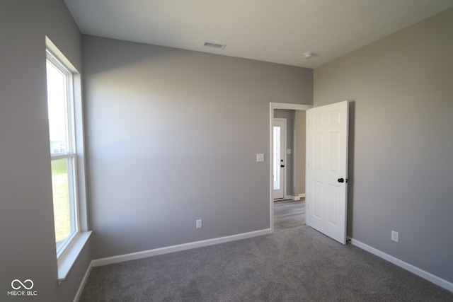 10609 Banyan Wood Ct, Indianapolis, IN 46239 - unfurnished room with carpet flooring and baseboards