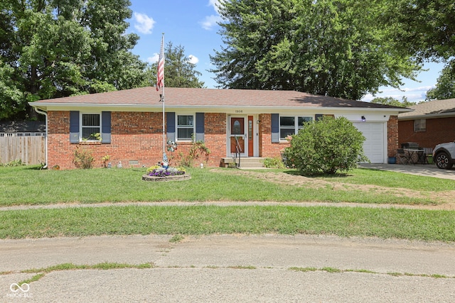 ranch-style house with fence, driveway, a front lawn, a garage, and brick siding