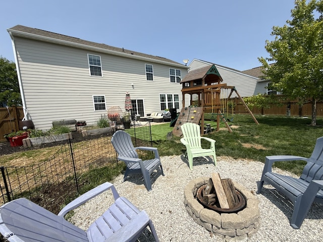 6345 Meadowview Dr, Whitestown, IN 46075 - rear view of property with an outdoor fire pit, a playground, and a patio