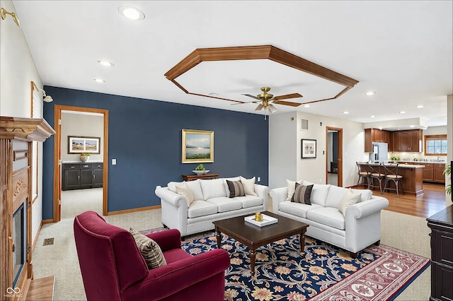 5371 Lue Ann Ln, Mooresville, IN 46158 - living room with visible vents, baseboards, a fireplace, ceiling fan, and recessed lighting
