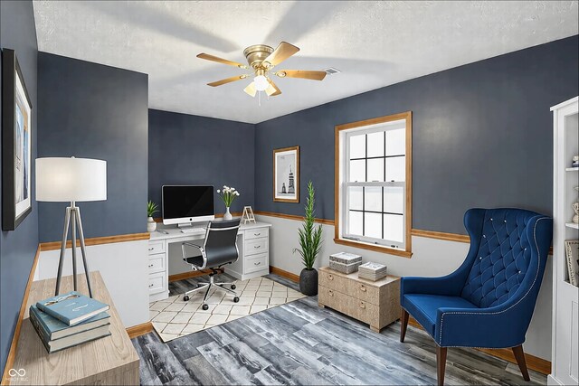 5371 Lue Ann Ln, Mooresville, IN 46158 - office area featuring baseboards, light wood-style floors, a textured ceiling, and ceiling fan