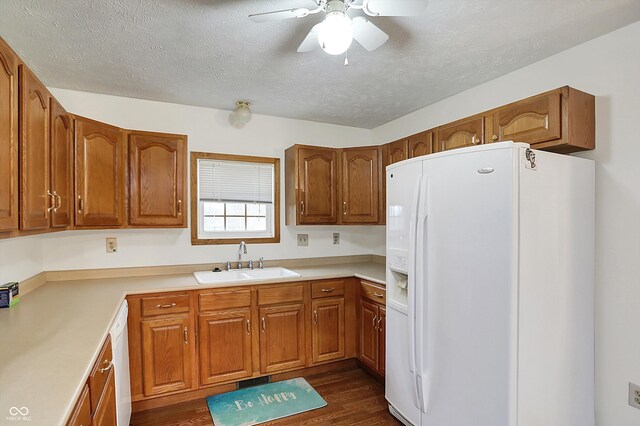 5371 Lue Ann Ln, Mooresville, IN 46158 - kitchen featuring white appliances, a ceiling fan, dark wood-type flooring, a sink, and brown cabinetry